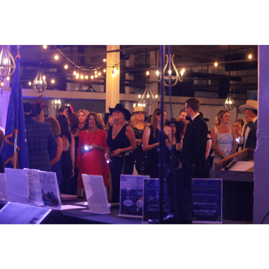 Bidders compete in the live auction