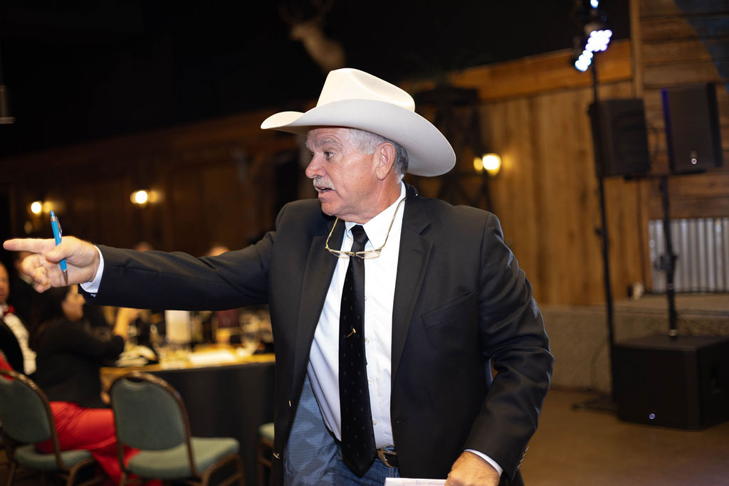 The auctioneer working the live auction