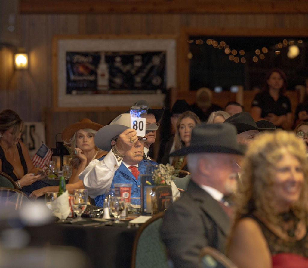 Bidder at the 2023 live auction