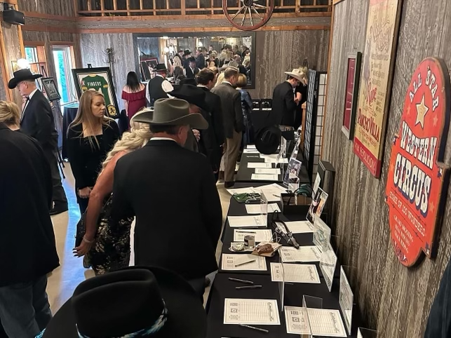 The silent auction tables at the 2023 gala